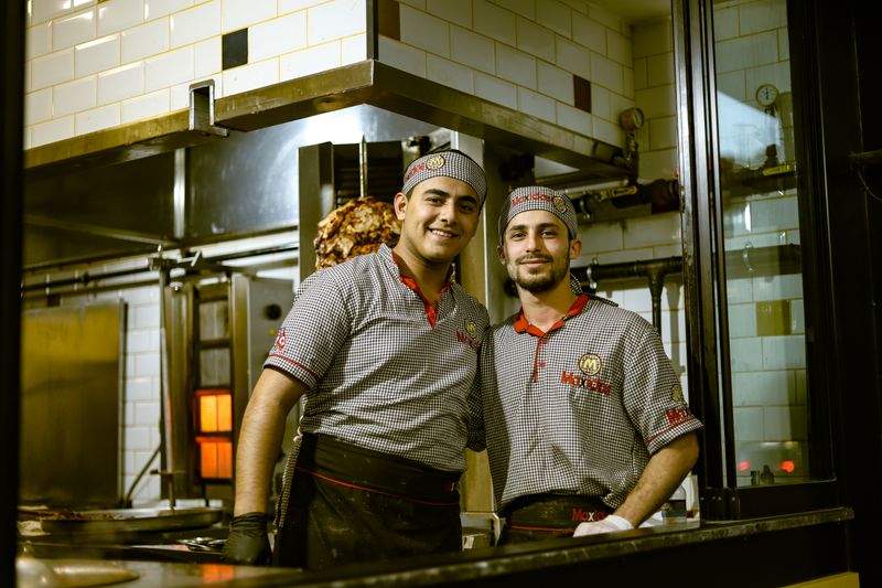 Chopt team members collaborating in the restaurant kitchen